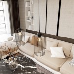 Lampa wisząca Vander 1BL w czarnej metalowej obudowie z siatką, z jednym miejscem na żarówkę E27. Zawieszona nad sofą w nowoczesnym wnętrzu, z widocznym stół i dekoracjami.