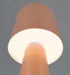 Lampa stołowa Nubian w kolorze kawowym z kloszem o cylindrycznym kształcie, wykonana z matowego materiału. Ujęcie z dołu, ukazujące źródło światła E27 oraz gładką powierzchnię. Tło w neutralnym odcieniu.