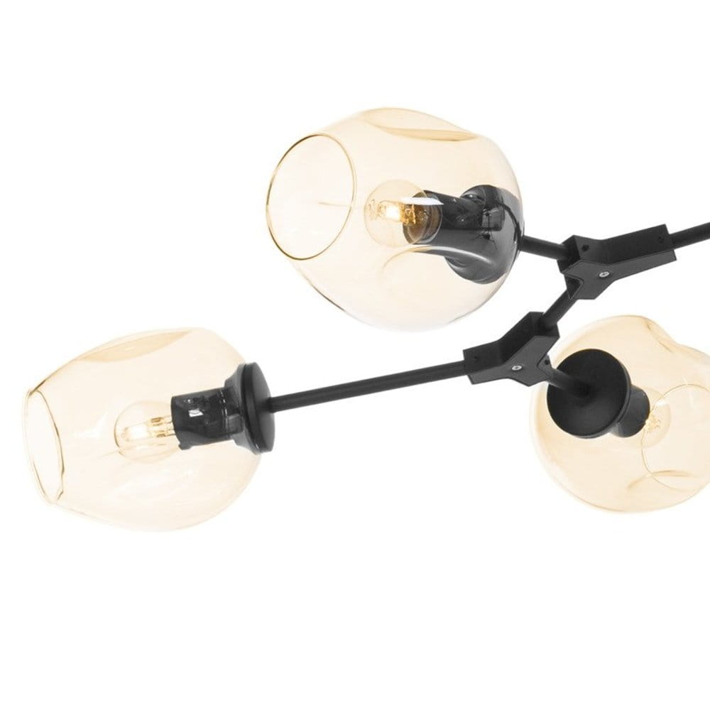 Lampa wisząca Modern Orchid w kolorze czarnym z bursztynowymi kloszami, przeznaczona na 6 żarówek E27. Ujęcie zbliżeniowe na detale kloszy i metalowej konstrukcji, eksponujące ich kształt i wykończenie.