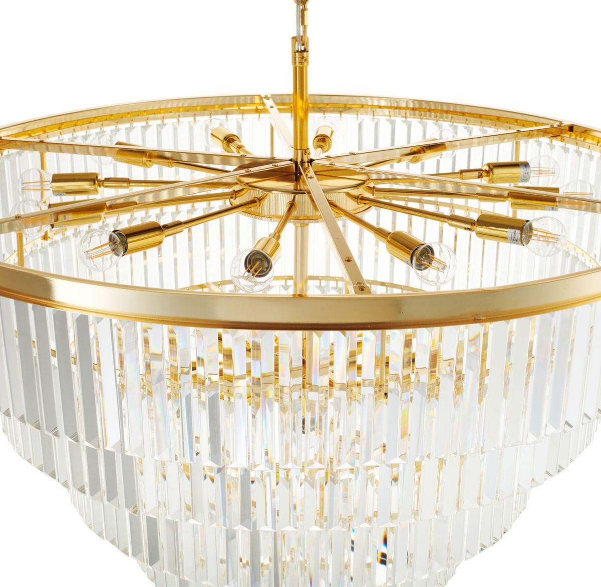 Lampa wisząca Splendore D100 w złotej oprawie, z 15 miejscami na żarówki E14. U góry widoczne złote ramiona z lampkami, a poniżej przezroczysta, teksturowana osłona z kryształowych elementów. Ujęcie z góry, ukazujące detal konstrukcji.