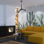 Lampa wisząca Sticks 6xG9 w kolorze czarnym, z nowoczesnym, geometrycznym kształtem. Zawieszona na czarnym przewodzie, z białymi elementami, idealna do aranżacji wnętrz. Widoczna w stylowym otoczeniu, w sali z żółtą sofą i roślinami.