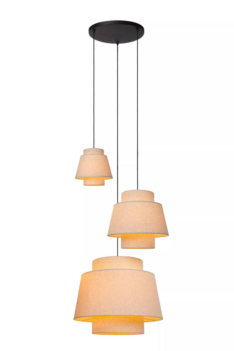 Lampa wisząca Tribute z trzema kloszami w kolorze kremowym, zawieszona na czarnych linkach. Klosze o różnych wysokościach mają prosty, cylindryczny kształt, co nadaje nowoczesny wygląd. Całość montowana do sufitu na okrągłej podstawie.