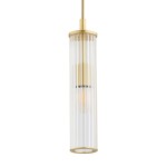 Lampa wisząca Hampton z mosiądzu, z przezroczystym kloszem w formie cylindrycznej, z widoczną żarówką E14. Zawieszona na cienkim kabelku, prezentuje elegancki design. Klosz z poziomymi żłobieniami, metalowe wykończenie w kolorze mosiądzu.