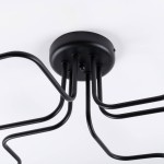 Czarna lampa sufitowa Vector z sześcioma miejscami na żarówki E27, metalowa konstrukcja z wygiętymi ramionami. Ujęcie z dołu, ukazujące mocowanie oraz stylowy design. Idealna do nowoczesnych wnętrz.