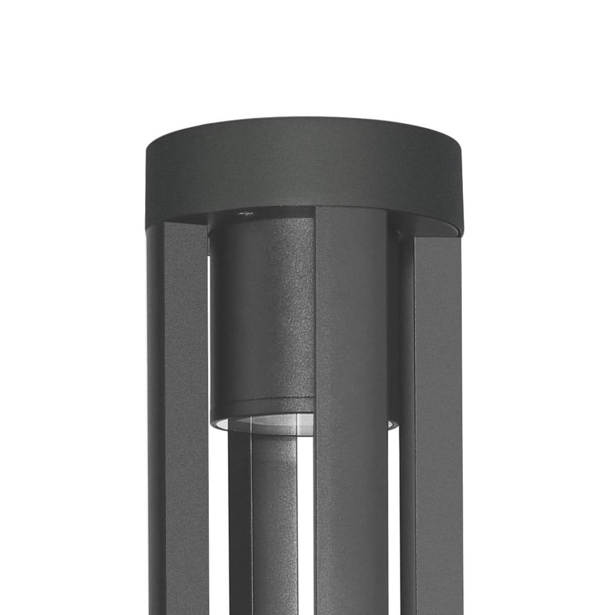 Czarna lampa ogrodowa Ratel H60 z 1xLED/10W, z cylindrycznym kloszem i prostymi, pionowymi szczelinami. Ujęcie z góry ukazuje górną część lampy i jej minimalistyczny design.