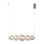 Lampa wisząca Butero z jedną żarówką LED 18W, w złotym kolorze. Posiada sześć przezroczystych, okrągłych kloszy na metalowej belce. Ujęcie z boku, zawieszona na cienkim, białym przewodzie. Idealna do nowoczesnych wnętrz.