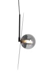 Lampa wisząca Fermi D45 w kolorze czarnym i grafitowym, z jedną oprawą G9. Okrągła, szklana kula w ciemnym odcieniu, zawieszona na cienkim, metalowym mocowaniu. Kąt ujęcia z boku, ukazujący detal konstrukcji i źródło światła.