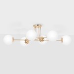 Lumia lampa sufitowa 6xE27 w kolorze złotym i białym, z sześcioma okrągłymi kloszami z matowego szkła, zamocowana na złotej podstawie. Lampa ma nowoczesny, minimalistyczny design i jest umieszczona w pozycji wiszącej.