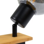 Lampa sufitowa Barel 1xE27 w kolorze czarnym z drewnianym akcentem. Ujęcie z boku, ukazujące metalowy korpus oraz szklany klosz, zamocowany na drewnianej podstawie. Stylowy design, idealny do nowoczesnych wnętrz.