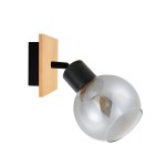 Lampa sufitowa Barel z pojedynczym spotem, montowana na ścianie. Posiada czarny metalowy uchwyt oraz okrągłą, przezroczystą klosz z drewna. Wymiary i detale wykończenia drewna widoczne na tle czarnego elementu montażowego.