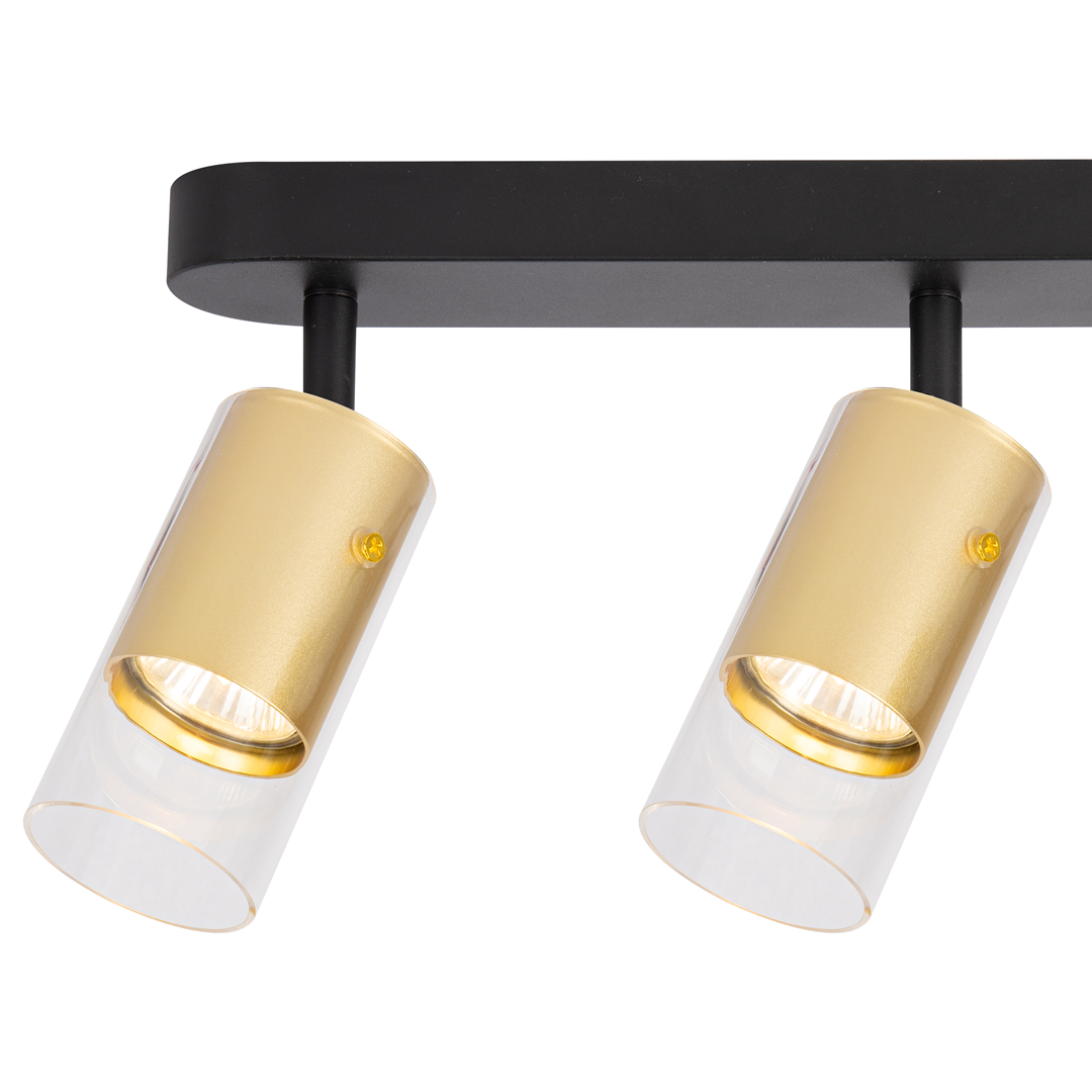 Lampa sufitowa Ricky w kolorze czarnym i złotym, z trzema oprawami GU10. Ułożona poziomo, z metalową podstawą i półprzezroczystymi kloszami, które eksponują żarówki. Elegancki design z nowoczesnym akcentem.