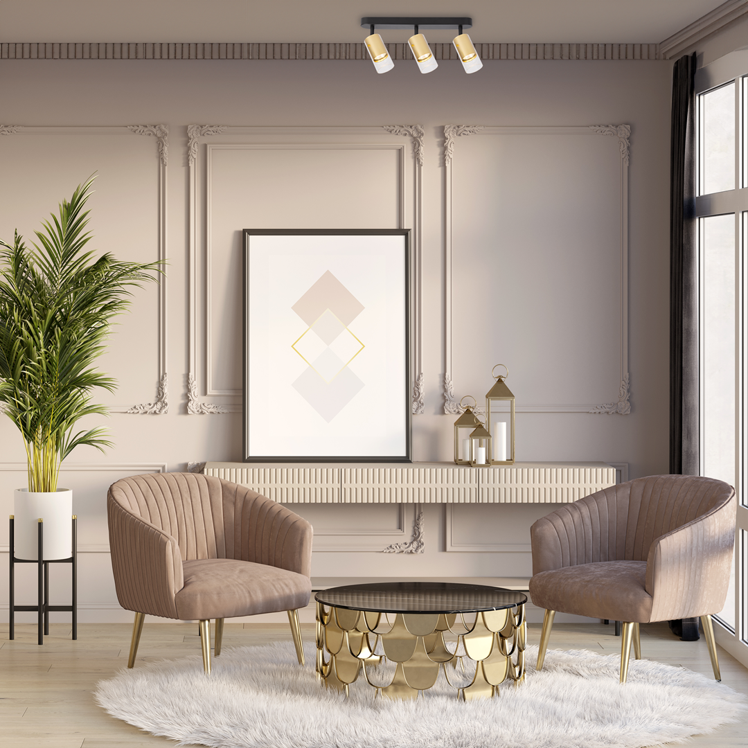 Czarna lampa sufitowa (spot) Ricky z trzema oprawami GU10, z metalowymi złotymi akcentami, zamontowana na ścianie w eleganckim wnętrzu. Lampa o prostym, nowoczesnym designie, idealna do oświetlenia pomieszczeń.