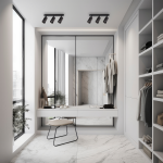 Czarna lampa sufitowa typu spot z trzema oprawami na żarówki GU10, zamontowana na białym suficie. Produkt znajduje się w nowoczesnym wnętrzu z dużymi oknami, odbijającymi światło w lustrach oraz minimalistycznymi meblami.