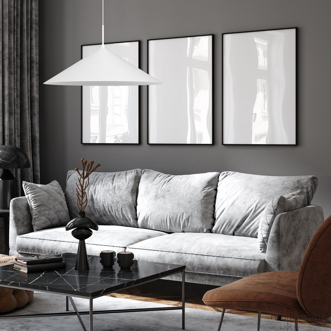 Lampa wisząca Capital D60 w kolorze białym, o kształcie stożkowym, zawieszona na cienkim przewodzie. Znajduje się nad szarym sofą w nowoczesnym wnętrzu, w towarzystwie minimalistycznych ram w kolorze czarnym na ścianie.