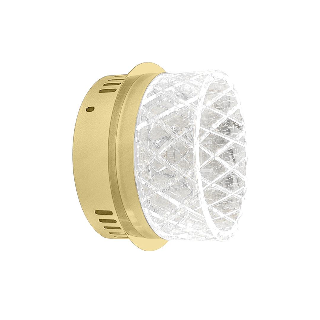 Kinkiet Elegance 1xLED/9W w złotej oprawie, z przezroczystym, diamentowym kloszem. Produkt zamontowany na ścianie, ukazujący elegancki design i subtelne oświetlenie. Idealny do nowoczesnych wnętrz.