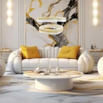 Lampa wisząca Preciosa z dwiema oprawami LED, w kolorze złotym, z przezroczystymi kryształkami. Zawieszona nad okrągłym stołem w nowoczesnym wnętrzu, z białą sofą i żółtymi poduszkami.