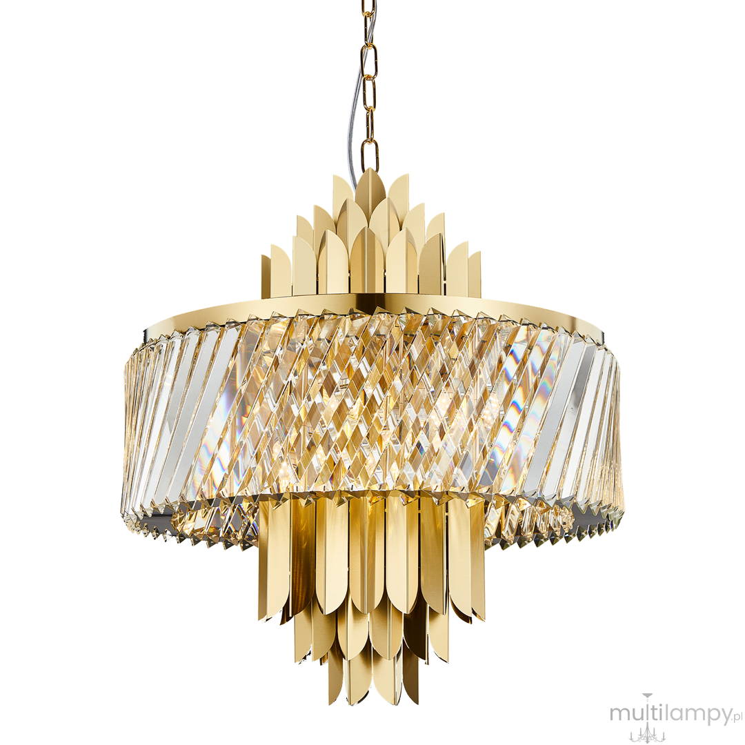 Lampa wisząca Margot w kolorze złotym z osłoną z kryształowych elementów w kształcie diamentów. Ma okrągłą formę, z dekoracyjnym zakończeniem w postaci liści. Wisi na cienkim łańcuszku, idealna do eleganckich wnętrz.