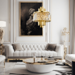 Lampa wisząca Margot w kolorze złotym, z sześcioma oprawami E14, z kryształowym kloszem i dekoracyjnymi elementami. Zawieszona w eleganckim wnętrzu z białą sofą i okrągłym stolikiem kawowym.