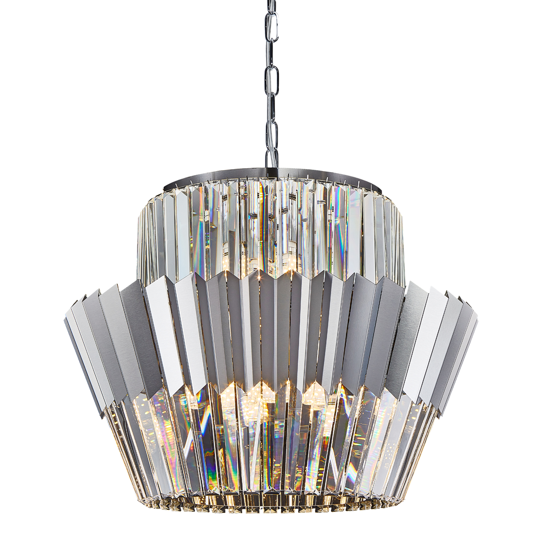Lampa wisząca Donna z 12 miejscami na żarówki E14, w chromowanej obudowie. Geometryczny kształt z wieloma refleksyjnymi elementami, zawieszona na łańcuchu. Przezroczyste detale dodają elegancji, idealna do nowoczesnych wnętrz.