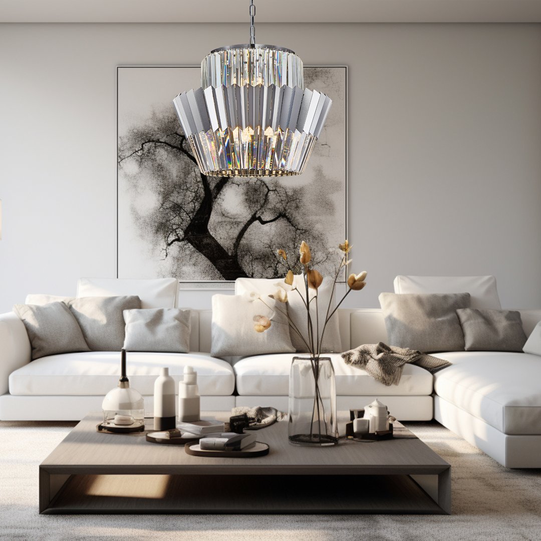 Lampa wisząca Donna o 12 gniazdach E14, w chromowanym wykończeniu, z dekoracyjnymi, przezroczystymi akcentami. Zawieszona w centralnej części pokoju, w otoczeniu jasnej kanapy i stylowego stolika kawowego, nadaje elegancki charakter wnętrzu.