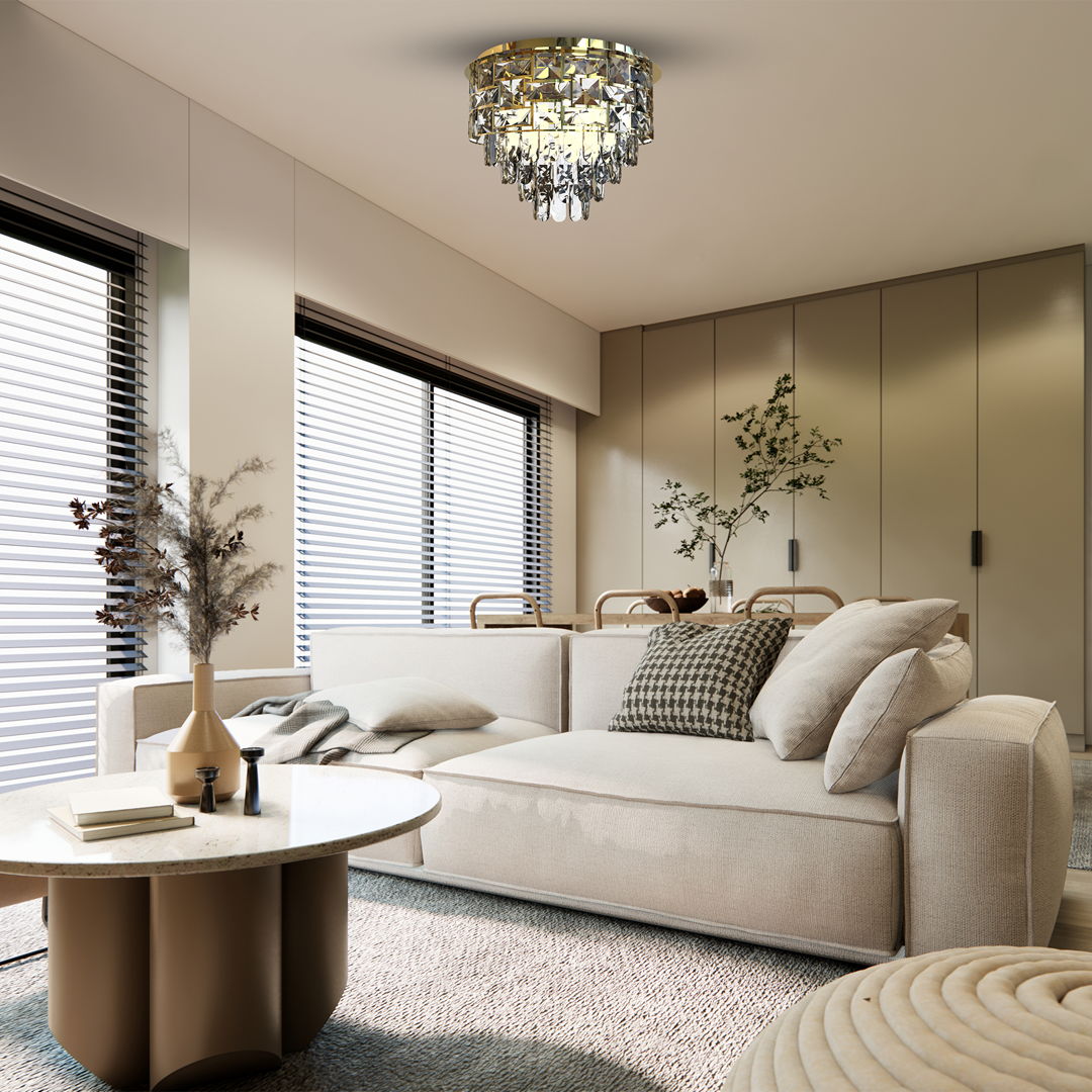Lampa sufitowa Luxuria 9xE14 w kolorze złotym, z dekoracyjnymi kryształkami, montowana na suficie. Widok z dołu w nowoczesnym wnętrzu, na tle jasnych ścian i okien z roletami. Idealna do eleganckiego oświetlenia pomieszczeń.