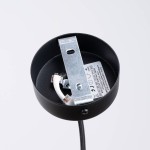 Lampa wisząca Electra w czarnej ceramice z miejscem na jedną żarówkę GU10. Widok z góry, ukazujący metalowy uchwyt mocujący oraz wnętrze oprawy. Tło białe, co podkreśla detale produktu.