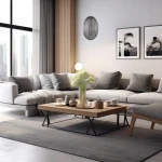 Lampa wisząca Braga 1xE27 w chromowanym wykończeniu, o dymionym kloszu w kształcie elipsy, zawieszona w nowoczesnym wnętrzu z szarym narożnikiem i drewnianym stolikiem kawowym. Tło z dużymi oknami oraz minimalistycznymi dekoracjami.