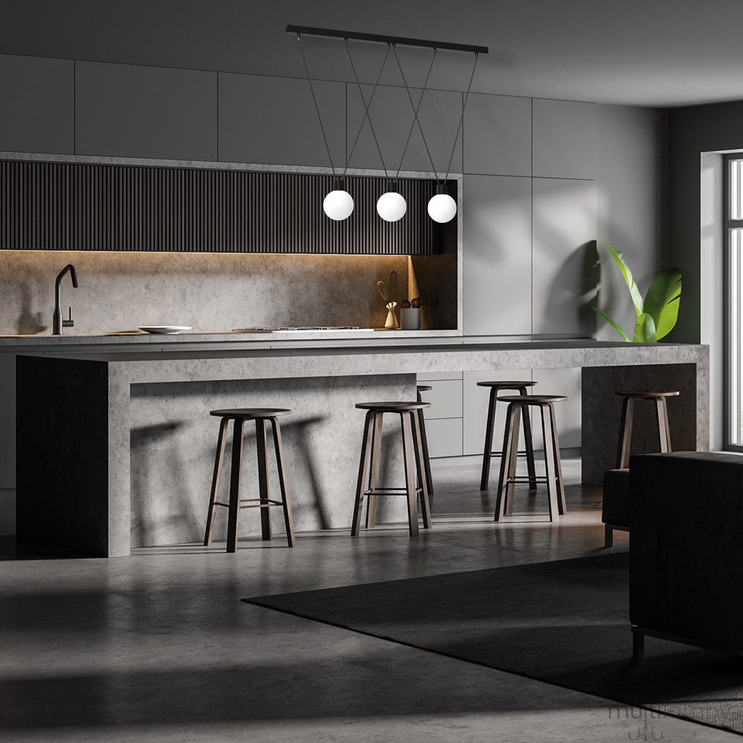 Lampa wisząca Capri 3xG9 w kolorze czarnym z białymi kloszami, zawieszona nad wyspą kuchenną. Widoczny nowoczesny design z metalową konstrukcją, w otoczeniu minimalistycznego wnętrza kuchni z betonowymi elementami i drewnianymi stołkami.