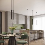 Lampa wisząca Arche 1xG9 w kolorze czarnym, zawieszona w nowoczesnej kuchni. Prosta, cylindryczna forma z metalowym wykończeniem, umieszczona nad stołem jadalnym. Tło w odcieniach szarości i zieleni, z dużymi oknami.