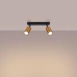 Lampa sufitowa Winx w kolorze czarnym i miedzi z dwoma reflektorami GU10. Ujęcie frontalne, zamontowana na suficie, z widocznymi cylindrycznymi kloszami w odcieniu miedzi. Proste, eleganckie wzornictwo, idealna do nowoczesnych wnętrz.
