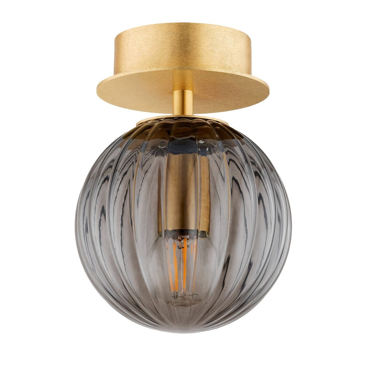 Kinkiet Paloma 1xE14 w mosiężnym wykończeniu z dymnym, szklanym kloszem. Okrągły kształt z widoczną żarówką, zamocowany do sufitowej podstawy. Klosz z delikatnym wzorem, w kolorze dymnym, tworzy elegancki akcent w aranżacji wnętrza.