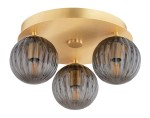 Lampa sufitowa Paloma w mosiężnym wykończeniu z trzema dymnymi kulami. Kule mają fakturę wzdłużnych rowków, a każda z nich mieści żarówkę E14. Lampa zamontowana na okrągłej, złotej podstawie.