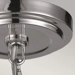 Lampa wisząca Tabby z mocowaniem E27, w wykończeniu satynowego niklu. Zbliżenie na sufitową podstawę z metalowym akcentem, widoczny element łączenia oraz linka. Prosty, nowoczesny design, idealny do różnych aranżacji wnętrz.