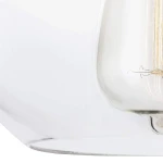 Lampa wisząca Tabby w kolorze satynowego niklu z kloszem w przezroczystym szkle. Widok z boku, ukazujący żarówkę E27 wewnątrz klosza. Produkt w pozycji wiszącej, idealny do nowoczesnych wnętrz.