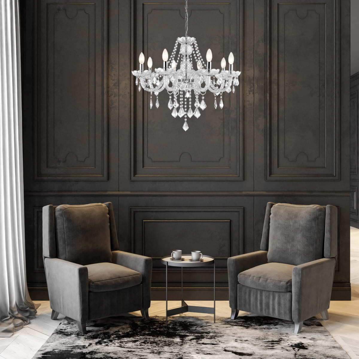 Żyrandol Cristallo 8-punktowy LP-2940/8P w eleganckim stylu, z przezroczystymi kryształami i ośmioma źródłami światła, zawieszony na cienkim łańcuchu, w aranżacji z szarymi fotelami i okrągłym stolikiem na tle ciemnej ściany.
