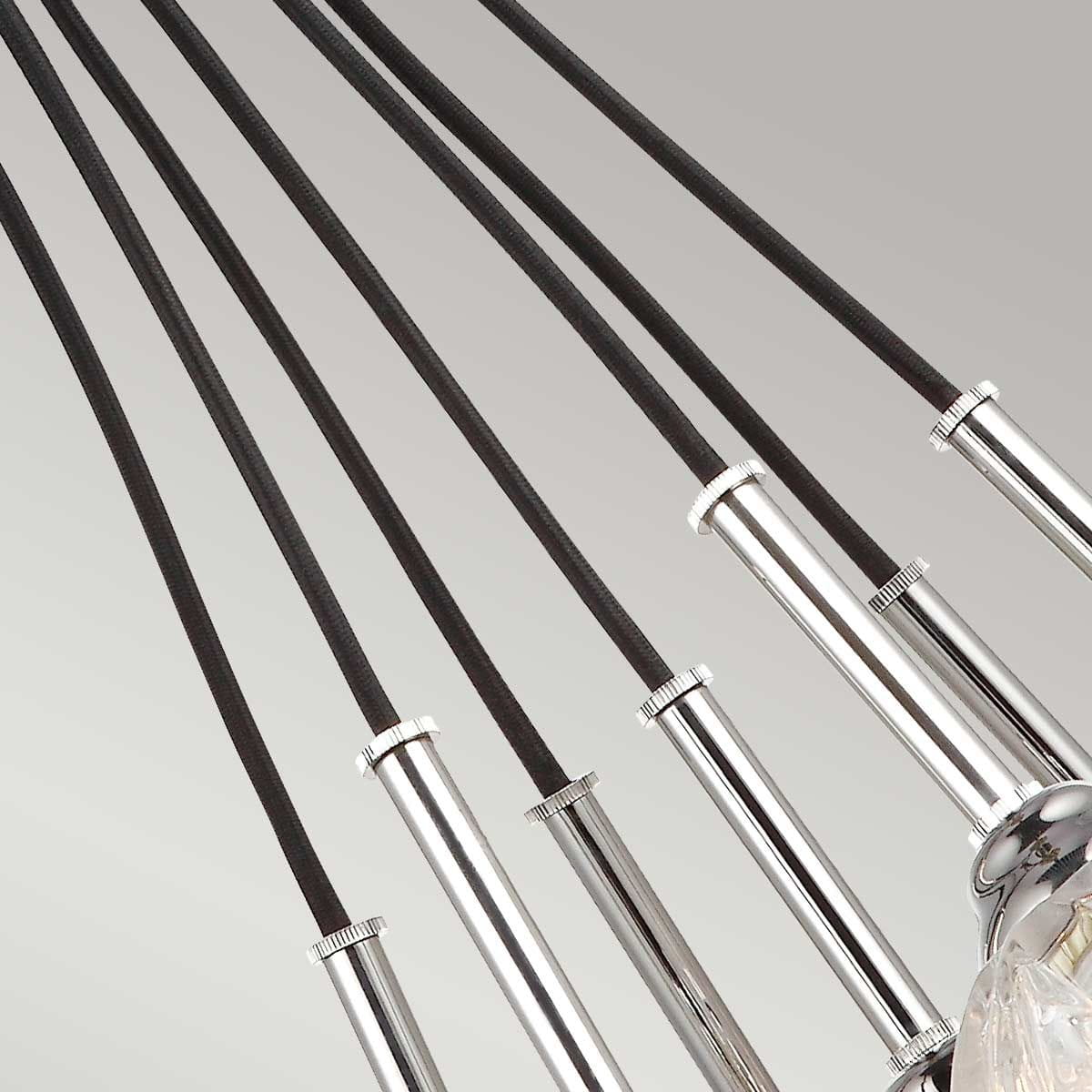 Lampa wisząca Rubin 7xG9 w satynowym niklu, z pięcioma czarnymi przewodami prowadzącymi do chromowanych mocowań. Widoczna elegancka konstrukcja z detalami metalowymi, idealna do nowoczesnych wnętrz.
