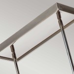 Lampa wisząca Rubin w kolorze satynowego niklu, z prostokątnym, metalowym kloszem. Ujęcie z góry, pokazujące detal konstrukcji oraz montaż. Przeznaczona do wykorzystania z 10 żarówkami G9.