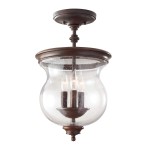 Lampa sufitowa Pickering w starym brązie, z przezroczystym kloszem w kształcie misy. Posiada trzy źródła światła E14, montowana na suficie z dekoracyjnym wykończeniem. Widoczne detale metalowe oraz lekko teksturowane szkło.