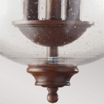 Lampa sufitowa Pickering w starym brązie z kloszem ze szkła o bąbelkowej strukturze. Widoczna dekoracyjna podstawa i metalowe trzonki na trzy żarówki E14. Ujęcie z dołu, ukazujące detale konstrukcji oraz fakturę materiałów.