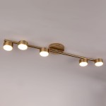 Lampa sufitowa Punto z pięcioma okrągłymi oprawami GX53 w kolorze złotym. Produkt zamontowany na suficie, z prostą, metalową konstrukcją w minimalistycznym stylu. Idealna do nowoczesnych wnętrz.