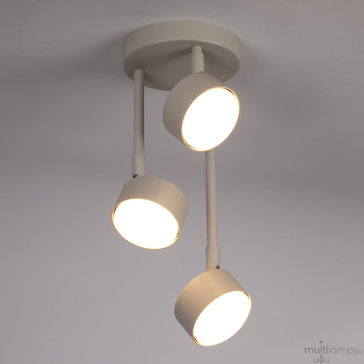 Lampa wisząca Nemo 3xGX53 w kolorze szarym i beżowym, składająca się z trzech okrągłych kloszy na regulowanych ramionach, zamontowana na okrągłej podstawie. Ujęcie z góry, na jednolitym tle.