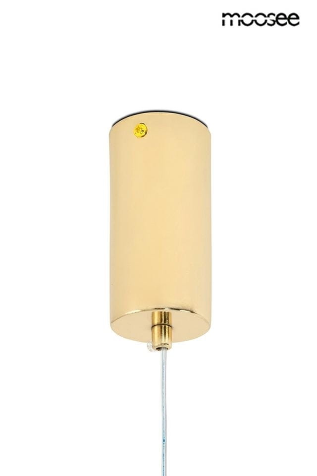 Złota lampa wisząca Ombre Level 100 o cylindrycznym kształcie, zawieszona na przezroczystym przewodzie. Z tyłu widoczna żółta nakładka. Lampa ma błyszczącą powierzchnię, co podkreśla jej elegancki wygląd.
