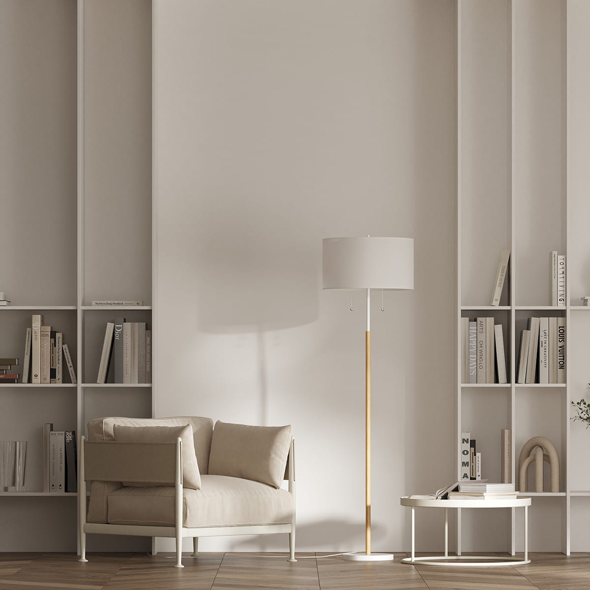 Biała lampa podłogowa Fogo z dwoma gniazdami E27, z metalowym stelażem w kolorze złotym. Lampa ma okrągły klosz, stojący na podłodze obok beżowej sofy w jasnym wnętrzu, na tle półek z książkami.