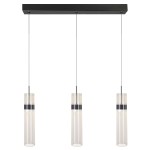 Lampa wisząca Ambiente LP-1510/3L w kolorze grafitowym z trzema kloszami LED. Klosze mają cylindryczny kształt z przezroczystym, żłobkowanym szkłem. Wisi na cienkich metalowych linkach, zamontowana na prostokątnej podstawie.