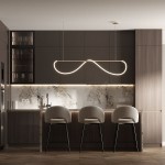 Lampa wisząca Meleca LP-2345/1P w kolorze złotym z pilotem, z nowoczesnym, falistym kształtem, zawieszona nad stołem barowym w ciemnej kuchni. Widoczna marmurowa półka i stylowe krzesła z jasnym obiciem.