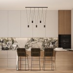 Czarna lampa wisząca Toledo z pięcioma źródłami światła GU10, zawieszona na cienkich linkach, umieszczona nad wyspą kuchenną. Tło w jasnych odcieniach z marmurowym blatem i drewnianymi szafkami.