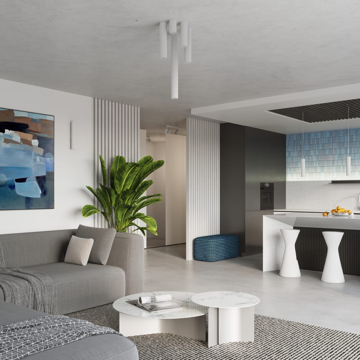 Lampa sufitowa Karbon 10 w kolorze białym z jedną oprawą GU10, zawieszona na suficie. Wyposażona w kilka cylindrycznych elementów, tworzy nowoczesny, minimalistyczny akcent w przestrzeni dziennej. W tle widoczna aranżacja wnętrza z rośliną i meblami.