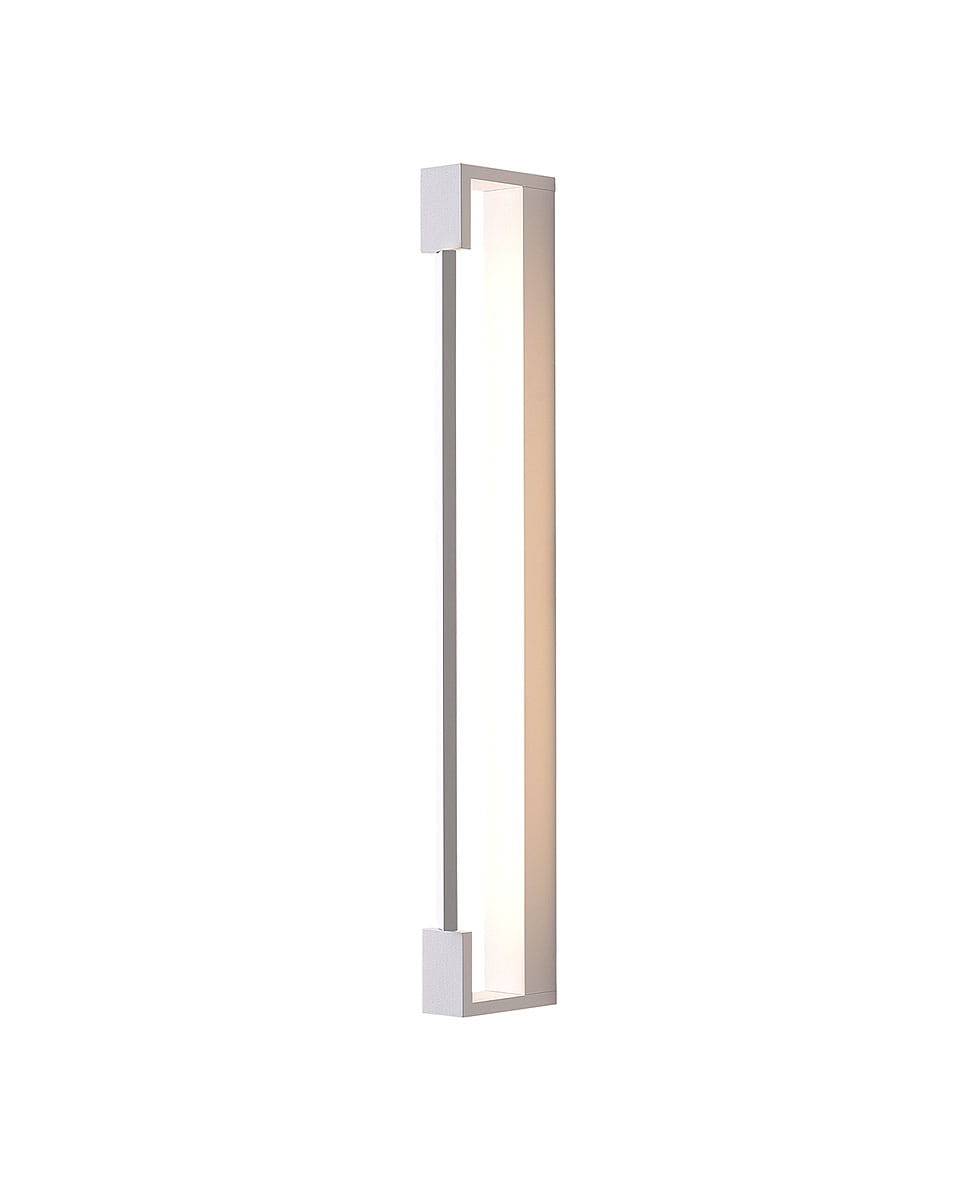 Biały kinkiet łazienkowy LED Flexia IP44 o długości 60 cm i mocy 18W. Prosty, prostokątny kształt, montowany na ścianie. Emituje ciepłe światło, idealny do oświetlenia wnętrza. Wykończenie matowe, z widocznymi elementami montażowymi.