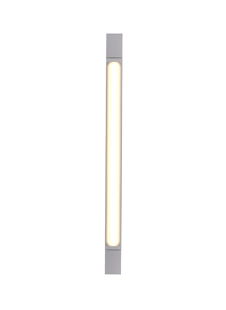 Flexia IP44 kinkiet łazienkowy LED L60/18W w kolorze białym, prostokątny, zamontowany pionowo. Obudowa metalowa, z wbudowanym źródłem światła LED. Ciepłe światło emitowane przez biały klosz. Produkt do użytku w łazienkach, odporny na wilgoć.