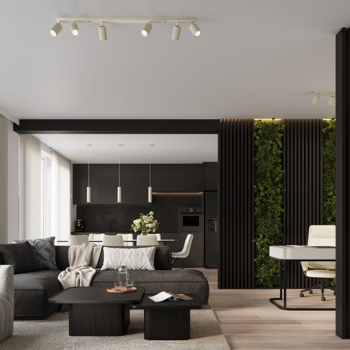 Beżowa lampa wisząca Karbon 1 z pojedynczym źródłem światła GU10. Montowana na suficie, z widocznymi kloszami w formie cylindrów. Lampa znajduje się w nowoczesnym wnętrzu z ciemnymi meblami i roślinami, tworząc stylową aranżację.